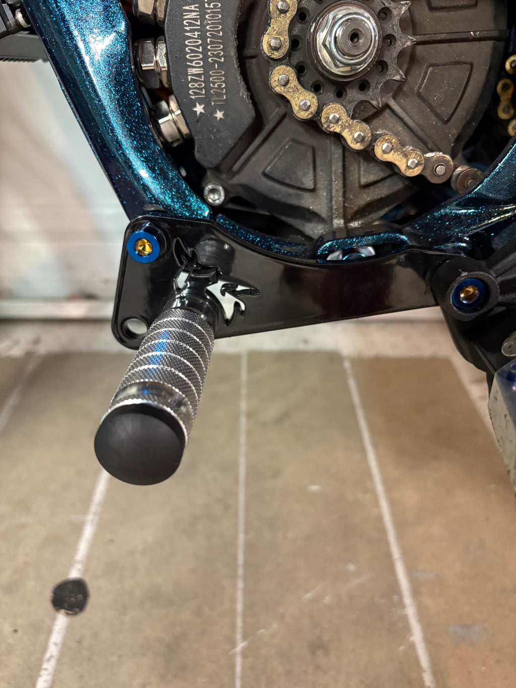 Talaria X3 footlock and bracket - Riot Racing